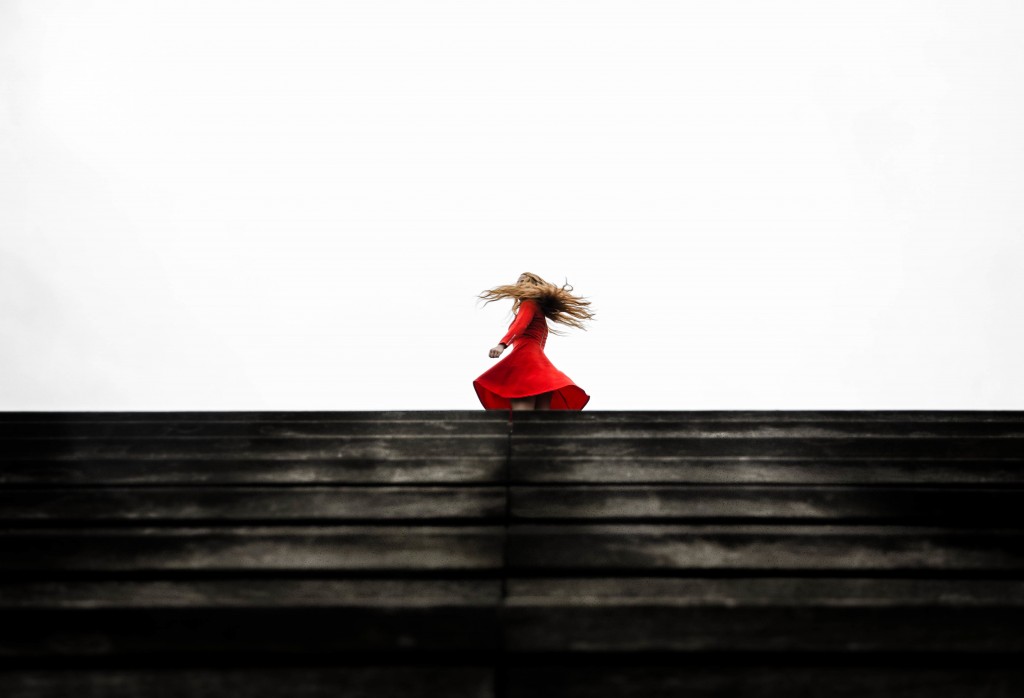 Woman in Red Dress Twirling